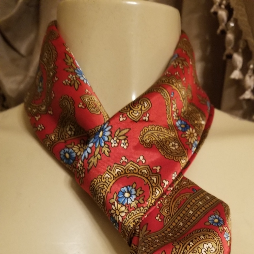 Colorful blue daisies on a Paisley print scarf